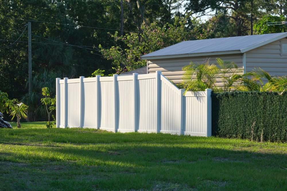 White,plastic,fence,for,back,yard,protection,and,privacy