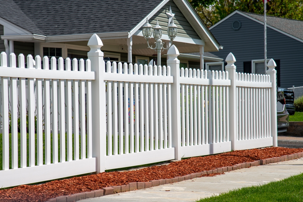 White,vinyl,fence,in,residential,neighborhood,home,nature,plastic,property