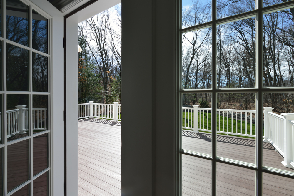 Garden,deck,view,through,the,window,glass.,french,door,opening