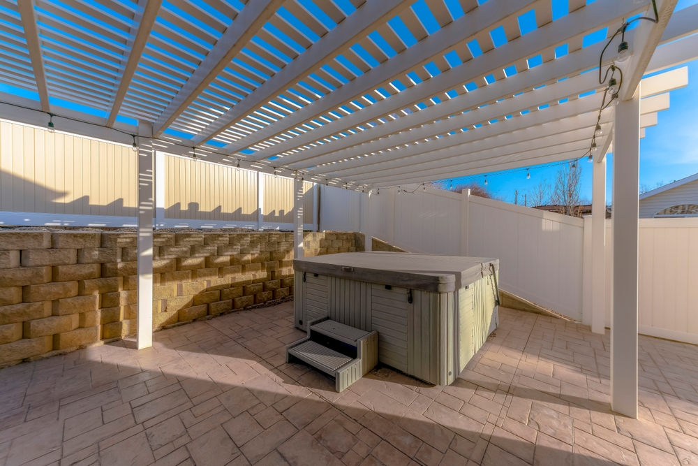 Covered,spa,pool,under,a,pergola,roof,sunshade,with,string